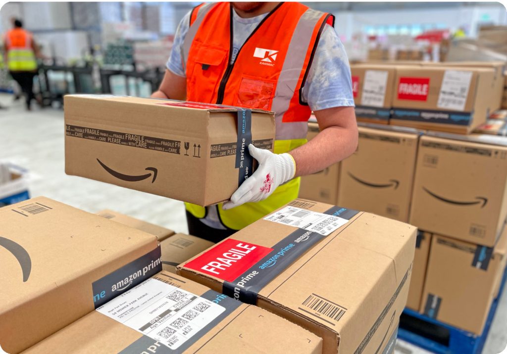 man holding parcel as part during ecom fulfillment process