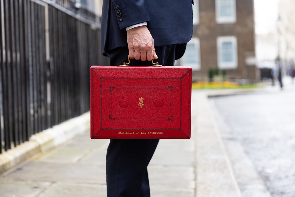 politician holding the red budget box